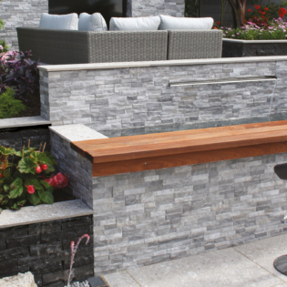 Rok Grey for the bar area shown with Natural Paving Carbon Black walling